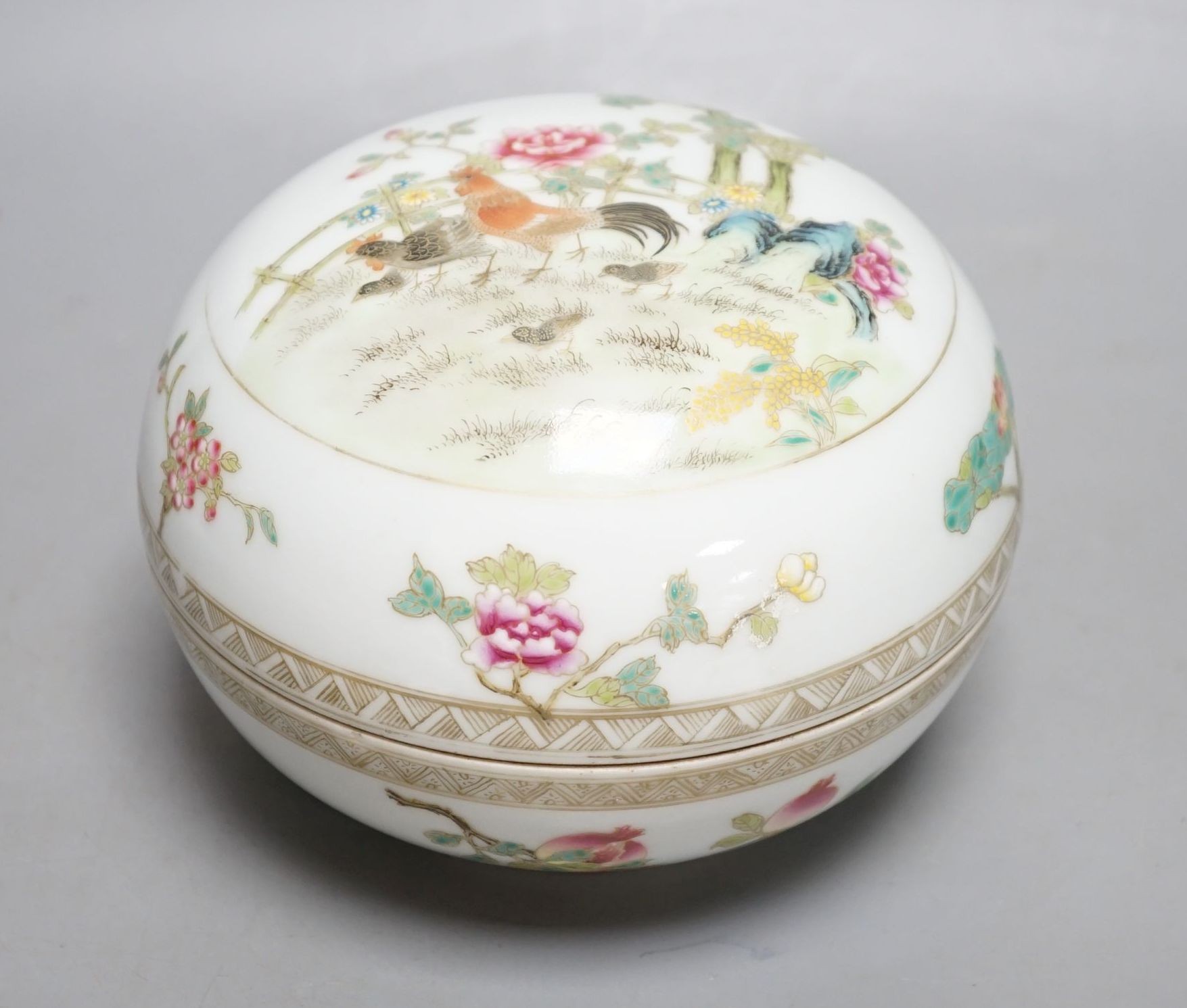 A Chinese famille rose’chickens’ box and cover, possibly Republic period, with mark, 13cms high.